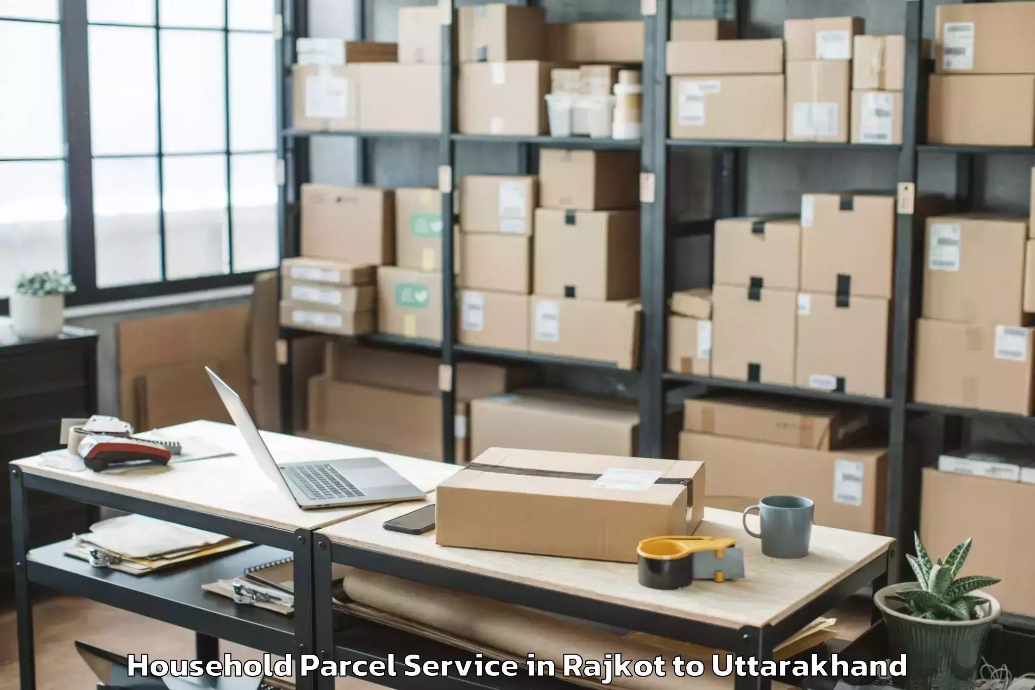 Trusted Rajkot to Tanakpur Household Parcel